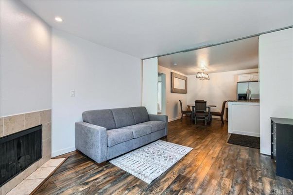 Dining room, Fireplace, Interior, Recessed Lighting, Wood Texture Flooring