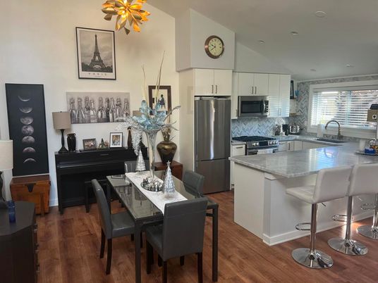 Dining room, Interior, Kitchen, Piano, Recessed Lighting, Stainless Steel Appliances, Wood Texture Flooring