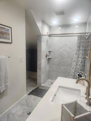Bathroom, Dual Sink Vanities, Interior, Marble, Marble Walls, Recessed Lighting