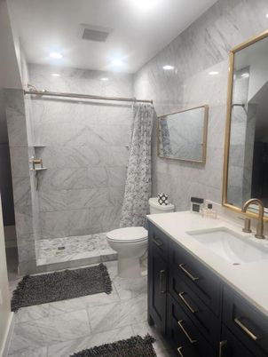 Bathroom, Dual Sink Vanities, Glass Shower, Interior, Marble, Marble Walls, Recessed Lighting
