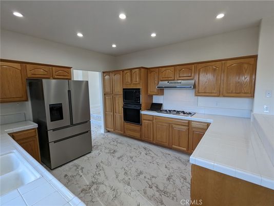 Interior, Kitchen, Marble, Recessed Lighting, Stainless Steel Appliances, Tile Countertops