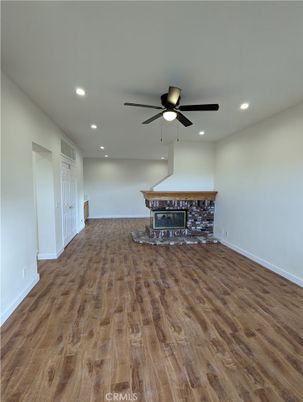 Empty room, Fireplace, Interior, Recessed Lighting, Wood Texture Flooring