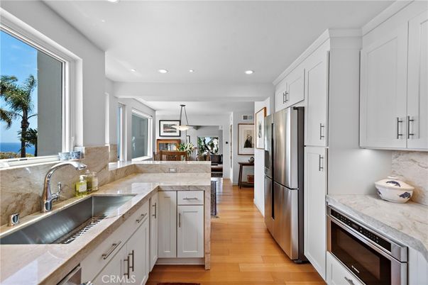 Interior, Kitchen, Pendant Lights, Recessed Lighting, Stainless Steel Appliances, Water, Wood Texture Flooring