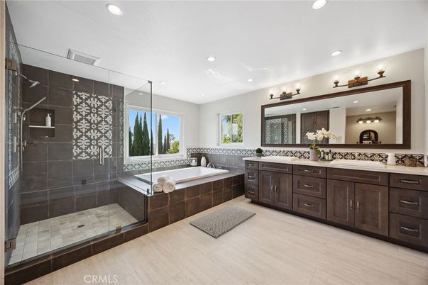 Bathroom, Dual Sink Vanities, Glass Shower, Interior, Recessed Lighting, Wood Texture Flooring