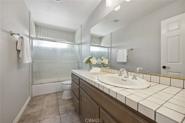 Bathroom, Glass Shower, Interior, Recessed Lighting, Tile Countertops