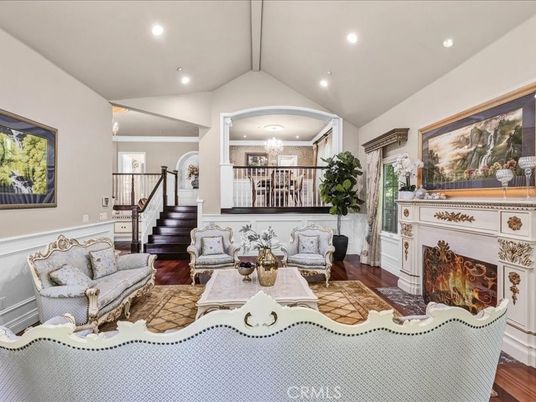Chandelier, Fireplace, Interior, Living room, Recessed Lighting, Wood Texture Flooring