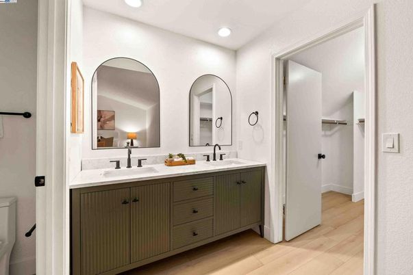 Bathroom, Dual Sink Vanities, Interior, Recessed Lighting, Walk-in Closets, Wood Texture Flooring
