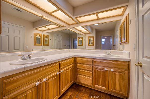 Bathroom, Dual Sink Vanities, Interior, Tile Countertops, Wood Texture Flooring