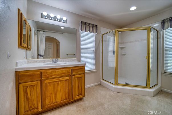 Bathroom, Dual Sink Vanities, Glass Shower, Interior, Recessed Lighting, Tile Countertops