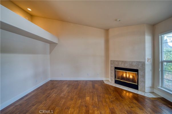 Empty room, Fireplace, Interior, Recessed Lighting, Wood Texture Flooring