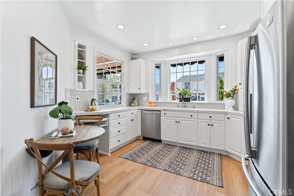 Dining room, Interior, Kitchen, Recessed Lighting, Stainless Steel Appliances, Wood Texture Flooring