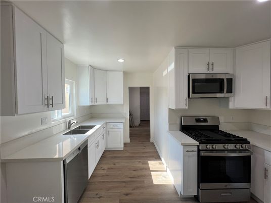 Interior, Kitchen, Recessed Lighting, Stainless Steel Appliances, Wood Texture Flooring