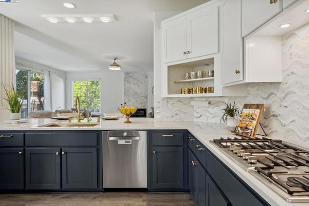 Interior, Kitchen, Marble Walls, Pendant Lights, Recessed Lighting, Stainless Steel Appliances, Wood Texture Flooring