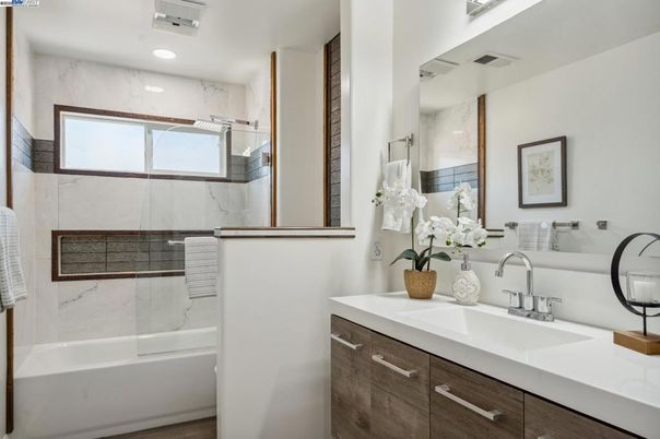 Bathroom, Dual Sink Vanities, Glass Shower, Interior, Marble Walls, Recessed Lighting