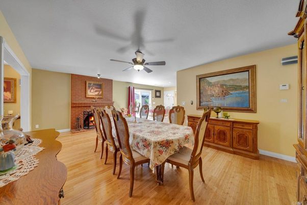 Dining room, Fireplace, Interior, Stone Walls, Wood Texture Flooring