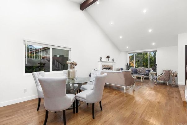 Dining room, Fireplace, Interior, Living room, Recessed Lighting, Wooden Beams, Wood Texture Flooring