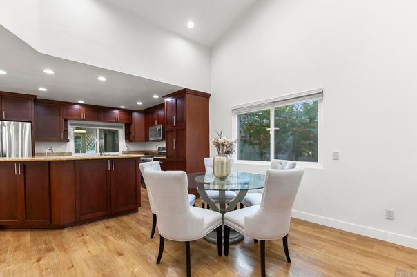 Dining room, Interior, Kitchen, Recessed Lighting, Stainless Steel Appliances, Wood Texture Flooring
