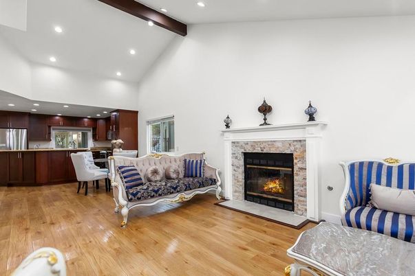 Dining room, Fireplace, Interior, Kitchen, Recessed Lighting, Stainless Steel Appliances, Wooden Beams, Wood Texture Flooring
