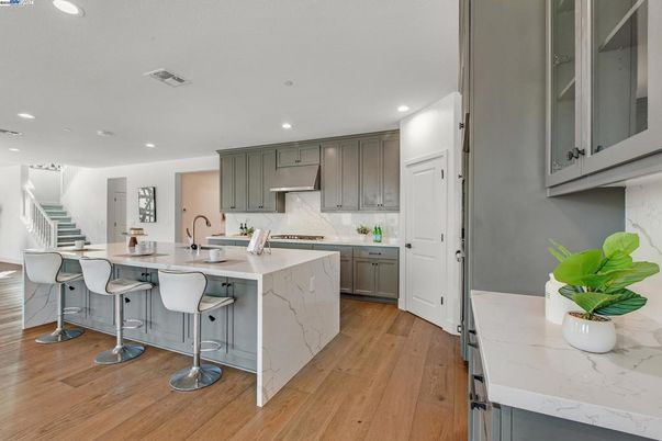 Interior, Kitchen, Marble Walls, Recessed Lighting, Wood Texture Flooring