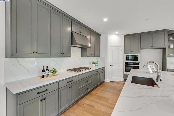Interior, Kitchen, Marble Walls, Recessed Lighting, Wood Texture Flooring