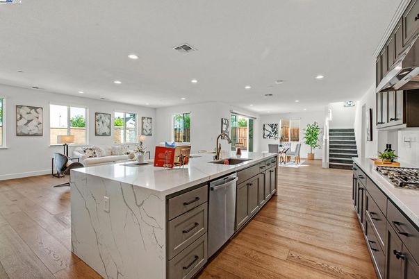 Dining room, Interior, Kitchen, Recessed Lighting, Stainless Steel Appliances, Wood Texture Flooring