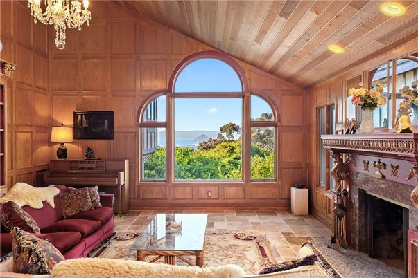 Chandelier, Fireplace, Interior, Living room, Piano, Recessed Lighting, Wooden Ceilings, Wooden Walls