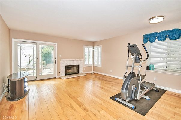Fireplace, Fitness Equipment, Interior, Wood Texture Flooring