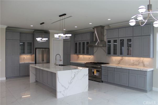 Interior, Kitchen, Marble, Marble Walls, Pendant Lights, Recessed Lighting, Stainless Steel Appliances