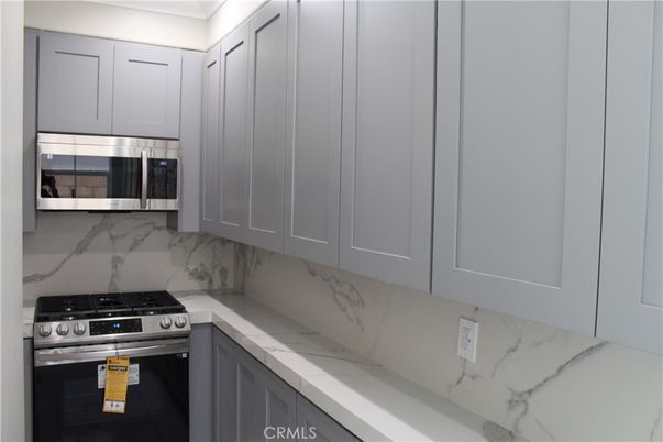 Interior, Kitchen, Marble Walls, Stainless Steel Appliances