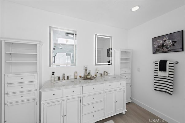 Bathroom, Dual Sink Vanities, Interior, Recessed Lighting, Wood Texture Flooring