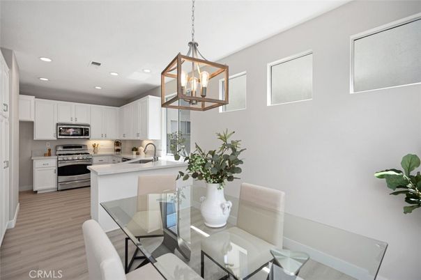 Dining room, Interior, Kitchen, Pendant Lights, Recessed Lighting, Stainless Steel Appliances, Wood Texture Flooring