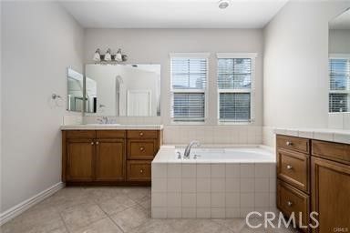 Bathroom, Dual Sink Vanities, Interior, Recessed Lighting, Tile Countertops