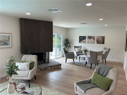 Dining room, Fireplace, Interior, Living room, Recessed Lighting, Wood Texture Flooring