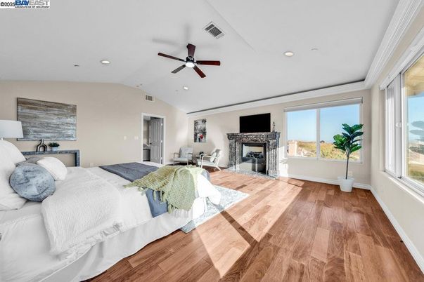 Bedroom, Fireplace, Interior, Recessed Lighting, Wood Texture Flooring