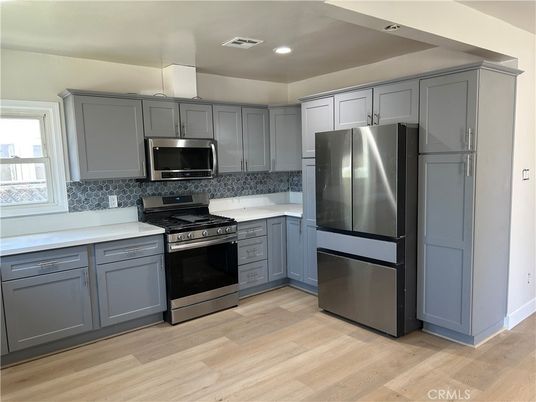 Interior, Kitchen, Recessed Lighting, Stainless Steel Appliances, Wood Texture Flooring