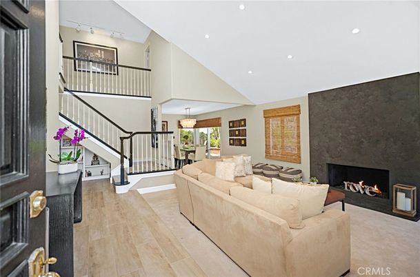 Chandelier, Dining room, Fireplace, Interior, Living room, Recessed Lighting, Wood Texture Flooring