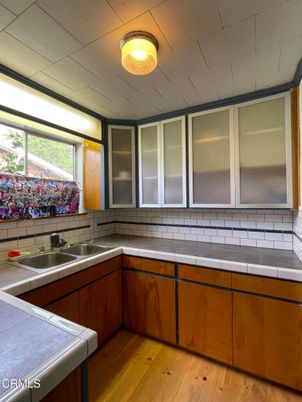 Interior, Kitchen, Tile Countertops, Wood Texture Flooring