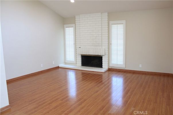 Empty room, Fireplace, Interior, Recessed Lighting, Wood Texture Flooring