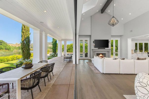 Dining room, Fireplace, Interior, Living room, Pendant Lights, Recessed Lighting, Wooden Beams, Wood Texture Flooring