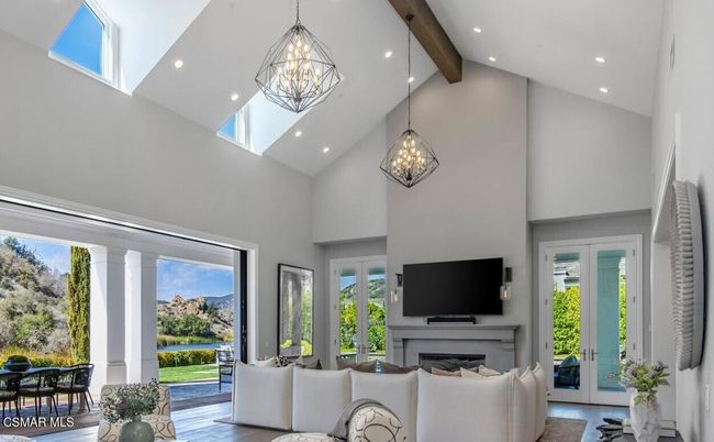 Chandelier, Fireplace, Interior, Living room, Pendant Lights, Recessed Lighting, Wooden Beams