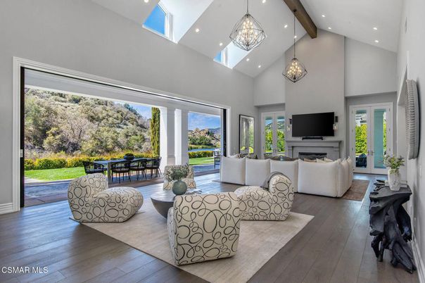 Dining room, Fireplace, Interior, Living room, Pendant Lights, Recessed Lighting, Wooden Beams, Wood Texture Flooring