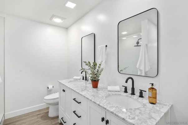 Bathroom, Dual Sink Vanities, Interior, Recessed Lighting, Wood Texture Flooring