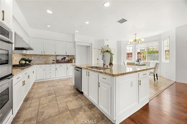 Dining room, Interior, Kitchen, Recessed Lighting, Stainless Steel Appliances, Wood Texture Flooring