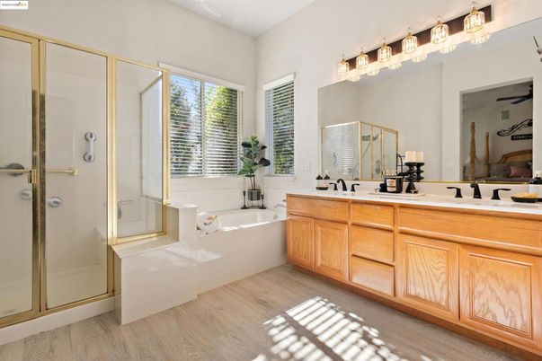 Bathroom, Dual Sink Vanities, Glass Shower, Interior, Wood Texture Flooring