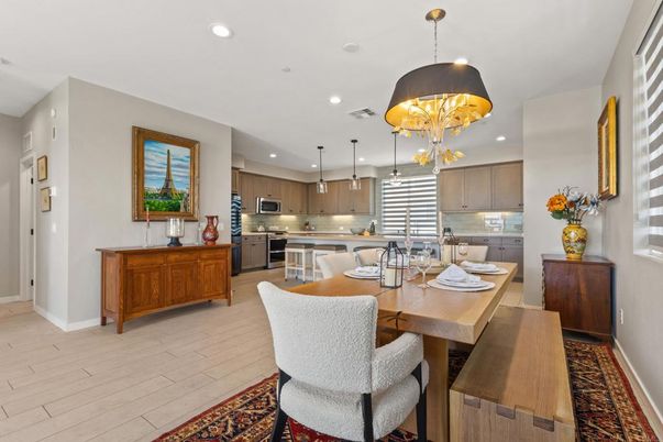 Chandelier, Dining room, Interior, Kitchen, Pendant Lights, Recessed Lighting, Stainless Steel Appliances, Wood Texture Flooring