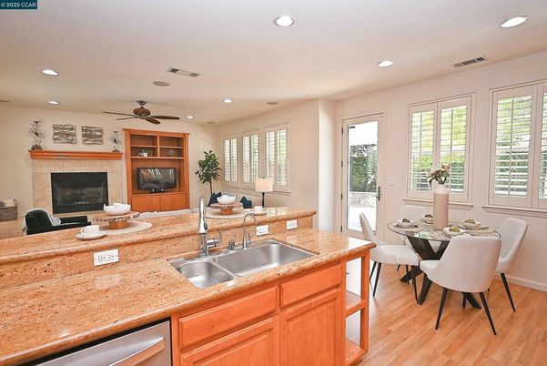 Dining room, Fireplace, Interior, Kitchen, Living room, Recessed Lighting, Wood Texture Flooring