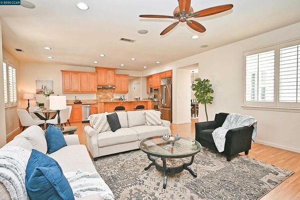 Dining room, Interior, Kitchen, Living room, Recessed Lighting, Stainless Steel Appliances, Wood Texture Flooring