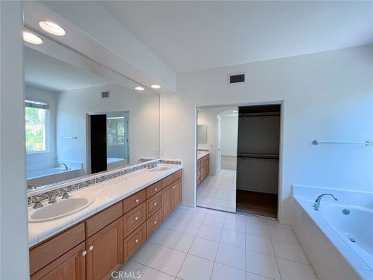 Bathroom, Dual Sink Vanities, Interior, Recessed Lighting, Tile Countertops