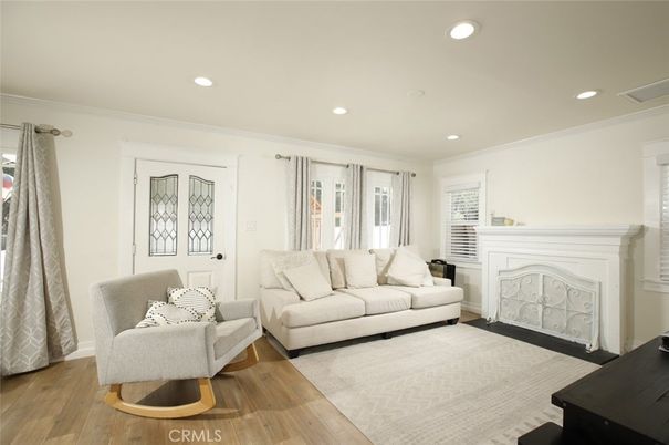 Fireplace, Interior, Living room, Recessed Lighting, Wood Texture Flooring