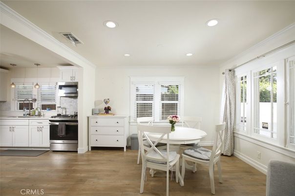 Dining room, Interior, Kitchen, Pendant Lights, Recessed Lighting, Stainless Steel Appliances, Wood Texture Flooring